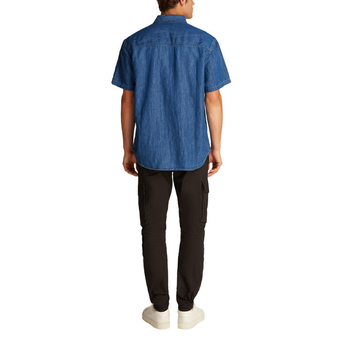 Calvin Klein Jeans Camicia Uomo Azzurro Manica Corta Bottoni Scollo Tondo Colletto Classico Tasca Interna 47% Cotone 20% Cotone Organico 19% Lino 14% Lyocell Primavera/Estate J30J327178
