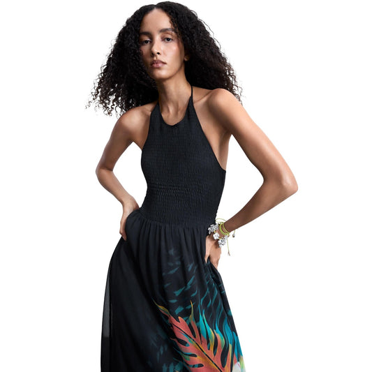 Abito midi Tropical SS26; Scollo americano con fiocco. Sopra arricciato elastico, gonna fluida stampata. Vestito multicolore fresco, leggero e di tendenza progettato a Barcellona.