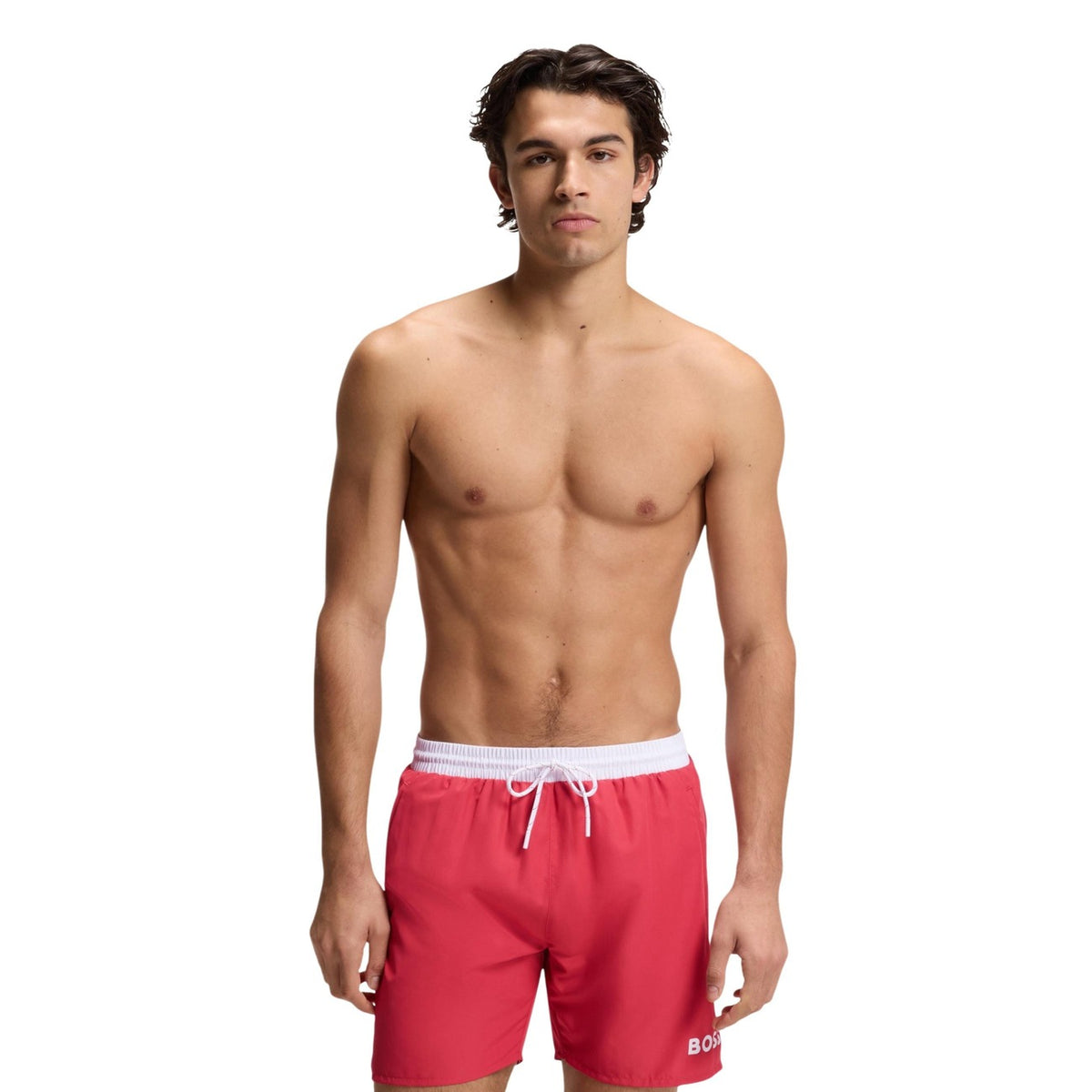 Boss Starfish Swim Shorts 10259586; 100% poliestere riciclato, vestibilità regolabile. L'essenziale Boss per uno stile mare sostenibile e raffinato. Colore corallo. Vista frontale