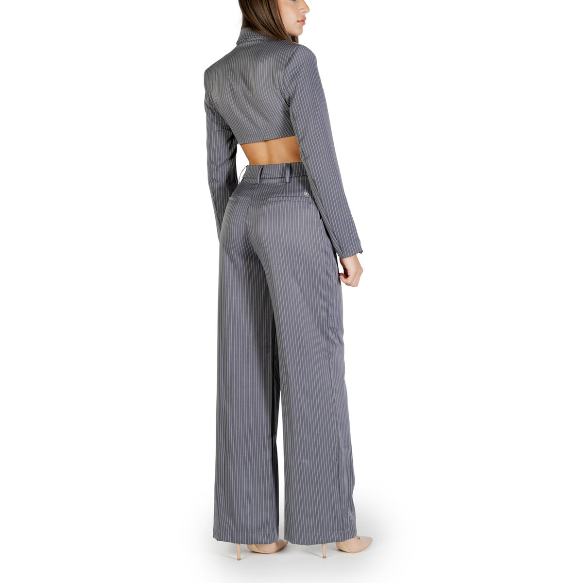 Tuta intera Colcci; Misto Viscosa Stretch. Dettagli cut-out, bottoni frontali, gamba larga. Jumpsuit donna elegante per cerimonie ed eventi serali.