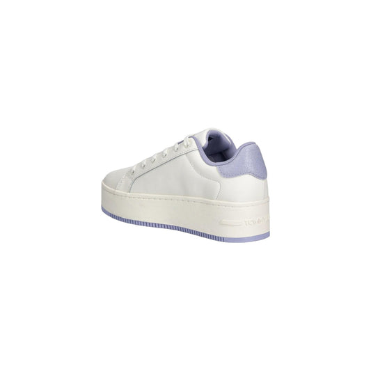 Sneakers Tommy Jeans Plateau; Mix Pelle/Materiali sintetici. Suola rialzata antiscivolo, soletta rimovibile, logo in rilievo. Stile urban basso, design robusto e di tendenza. Bianco e lilla vista Laterale