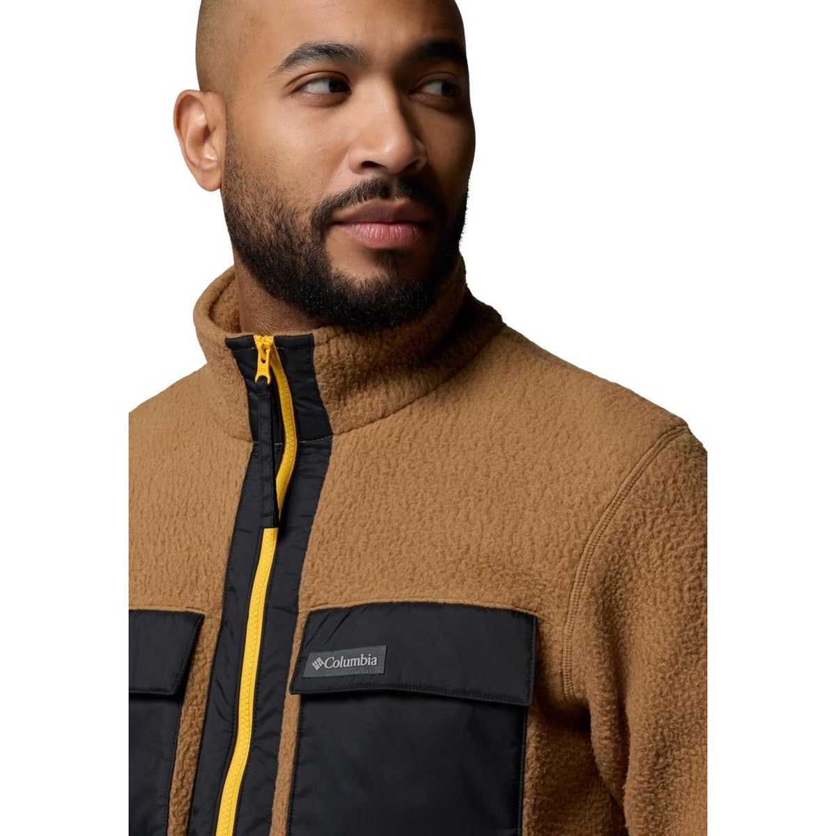 Giacca pile Columbia uomo 2131474. Pile sportivo con cerniera zip intera, taschini sul petto e dettagli a contrasto, vestibilità regolabile con coulisse, abbigliamento outdoor ecosostenibile autunno inverno.