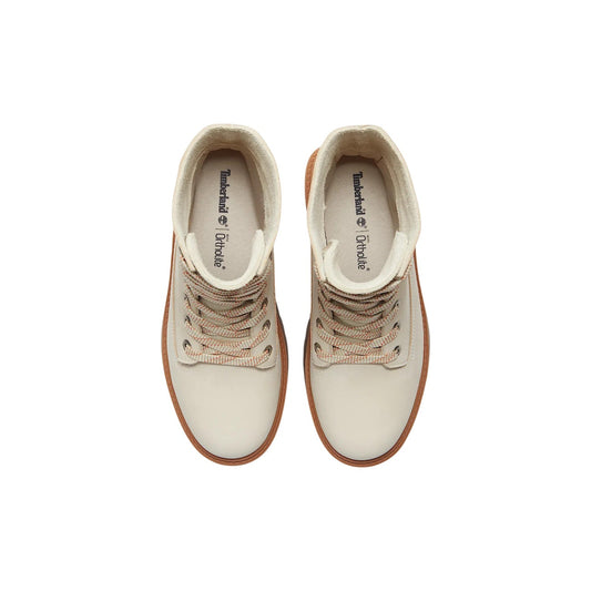 Stivali risvoltabili con plateau da donna Timberland Stone Street Mid Lace di colore beige. Modello in pelle Premium con suola alta preformata in gomma e soletta OrthoLite® Impressions.