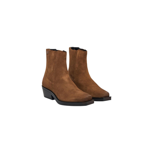 Stivaletti beige donna Tommy Jeans EN0EN03142. Stivali texani da donna in camoscio beige con punta squadrata, tacco basso 5 cm, bande elastiche e logo Tommy Jeans.
