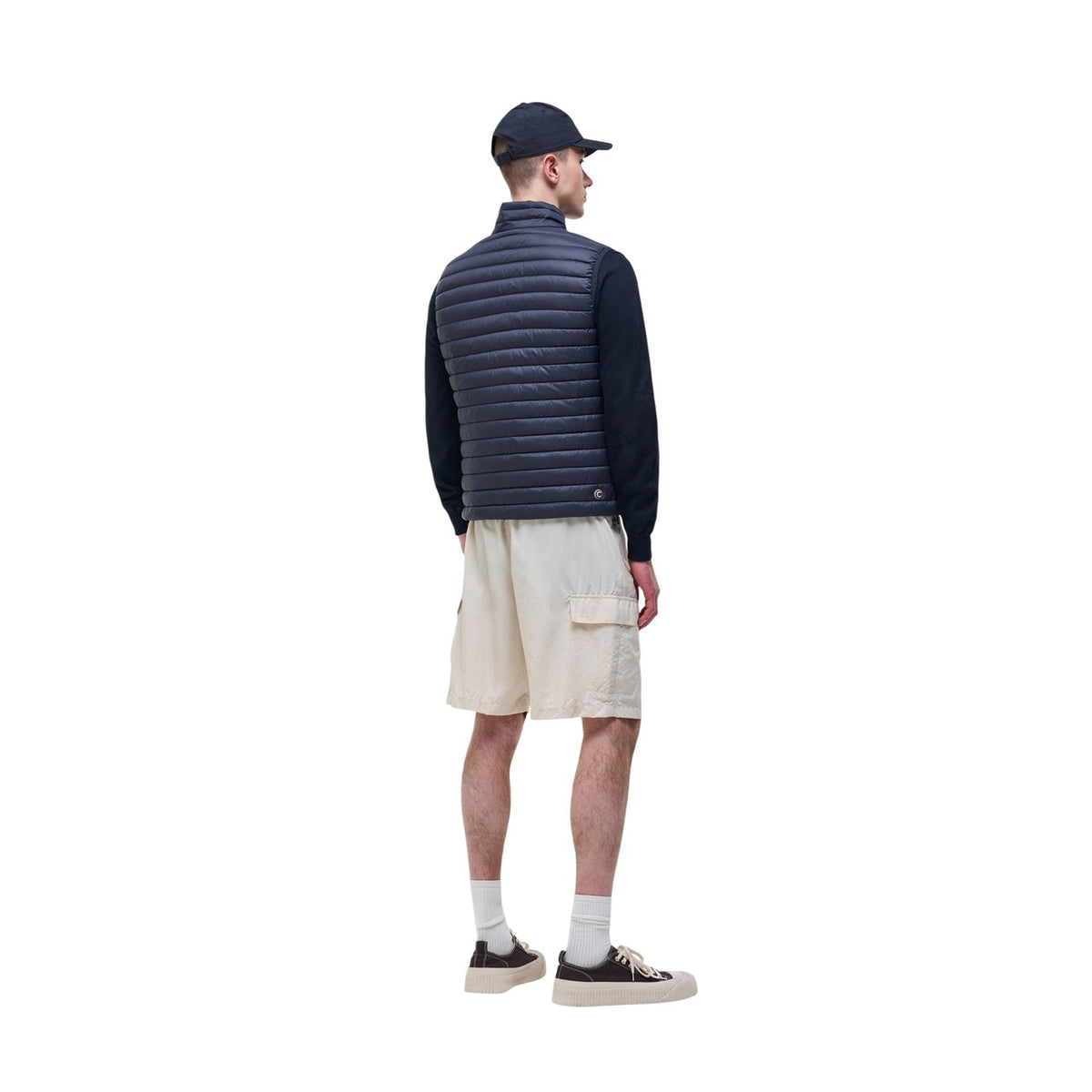 Gilet uomo Colmar Originals blu navy 100 grammi 1248 8VX. Smanicato leggero da uomo blu scuro idrorepellente con imbottitura in piuma, chiusura zip doppio cursore, coulisse sul fondo e logo al petto, gilet da mezza stagione casual sportivo.