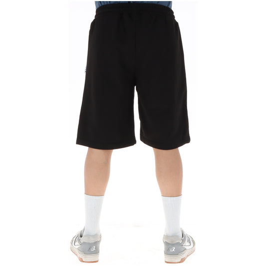 Bermuda ICON Neon Logo; 87% Cotone, 13% Poliestere. Nero con stampa giallo fluo, logo spezzato, vita con lacci. Short uomo streetwear energici e traspiranti, Made in Italy.Vista posteriore