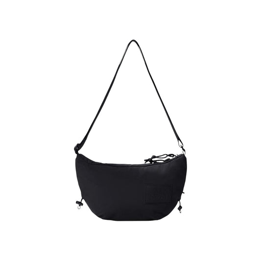 Borsa Tracolla The North Face Never Stop; 100% Nylon riciclato. Cerniere YKK, tasca posteriore con zip, tracolla satinata regolabile. Design vintage increspato, capiente e ultraleggera. Ideale per tempo libero e viaggi. Vista frontale
