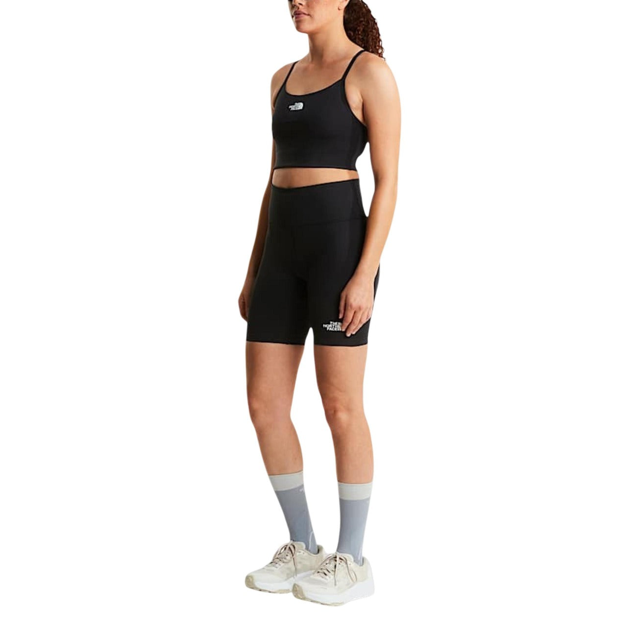 Top The North Face donna nero sportivo con logo senza maniche - vista frontale laterale indossato da modello figura intera