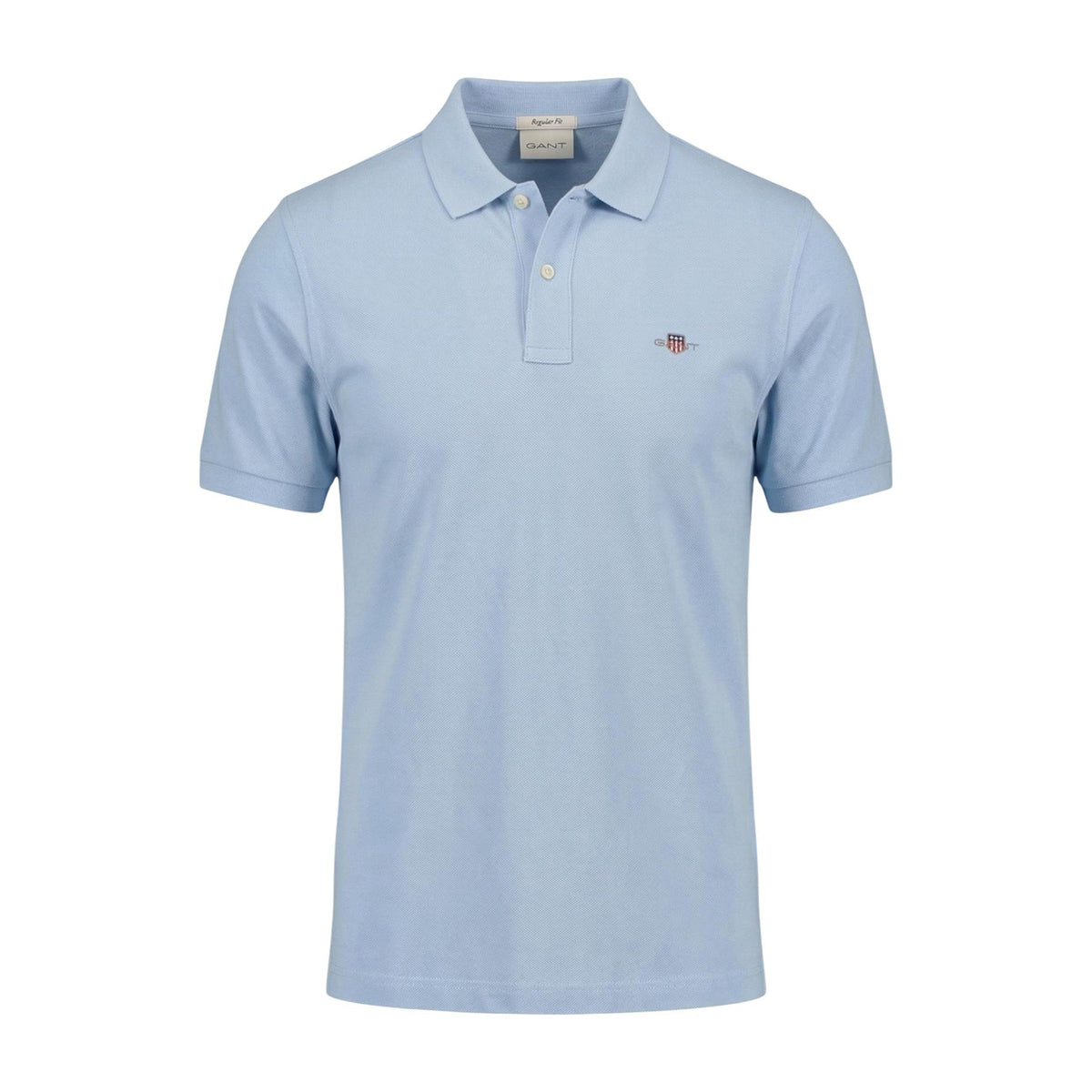 Polo GANT Shield; 97% cotone piqué, 3% elastam, colletto classico, logo ricamato. Stile versatile, elegante e confortevole. Colore azzurro. Vista frontale Stesa