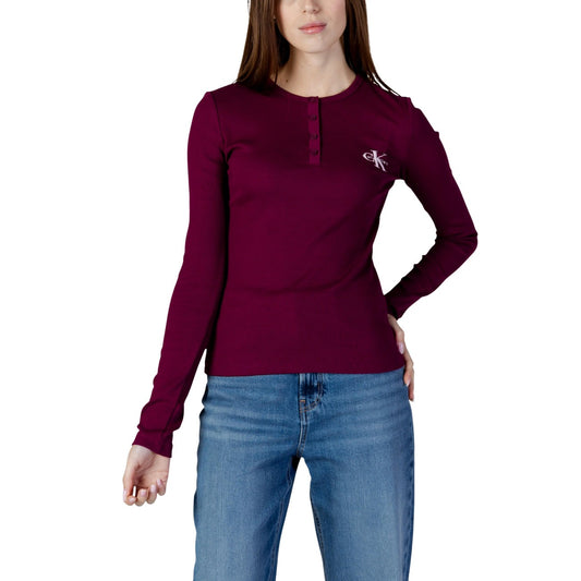Maglia Manica Lunga CK Jeans; Bordeaux. 95% Cotone, 5% Elastam. Scollo con bottoni, vestibilità stretch, logo ricamato. Stile casual raffinato ideale per il layering.