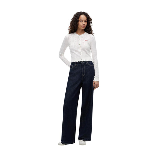 Cardigan Donna Bianco Tommy Hilfiger Jeans; Maglia slim fit traforata a maniche lunghe con bottoni, scollo tondo e motivo pointelle a bandierine. Dettagli smerlati, stile preppy casual e raffinato. Figura intera frontale