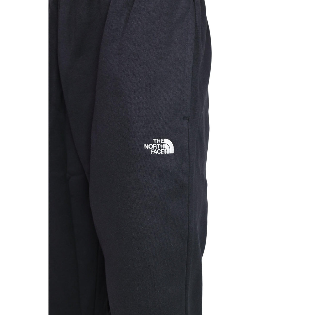 Pantaloni tuta The North Face uomo neri modello M EVO SD REG JOGGER. Pantalone jogger felpato invernale nero con polsini alle caviglie, elastico in vita e tasche stile sportivo, streetwear e da allenamento.