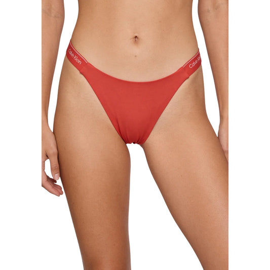 Bikini CK Jeans Arancione; 81% Poliestere Riciclato. Vita bassa, fasce elastiche con logo, tessuto stretch. Asciugatura rapida e fit confortevole, ideale per mare e piscina. Vista frontale
