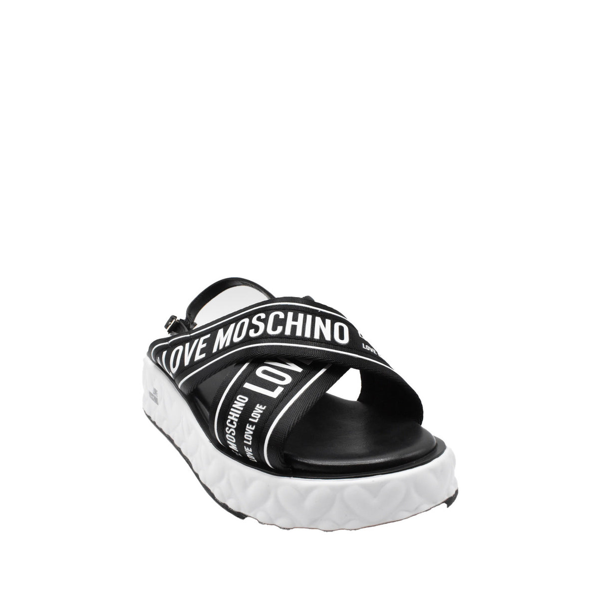 Sandali Love Moschino donna neri in pelle modello B_44919. Sandalo estivo basso in vera pelle nera con suola in gomma confortevole, calzatura flat di marca comoda ed elegante per la stagione calda.