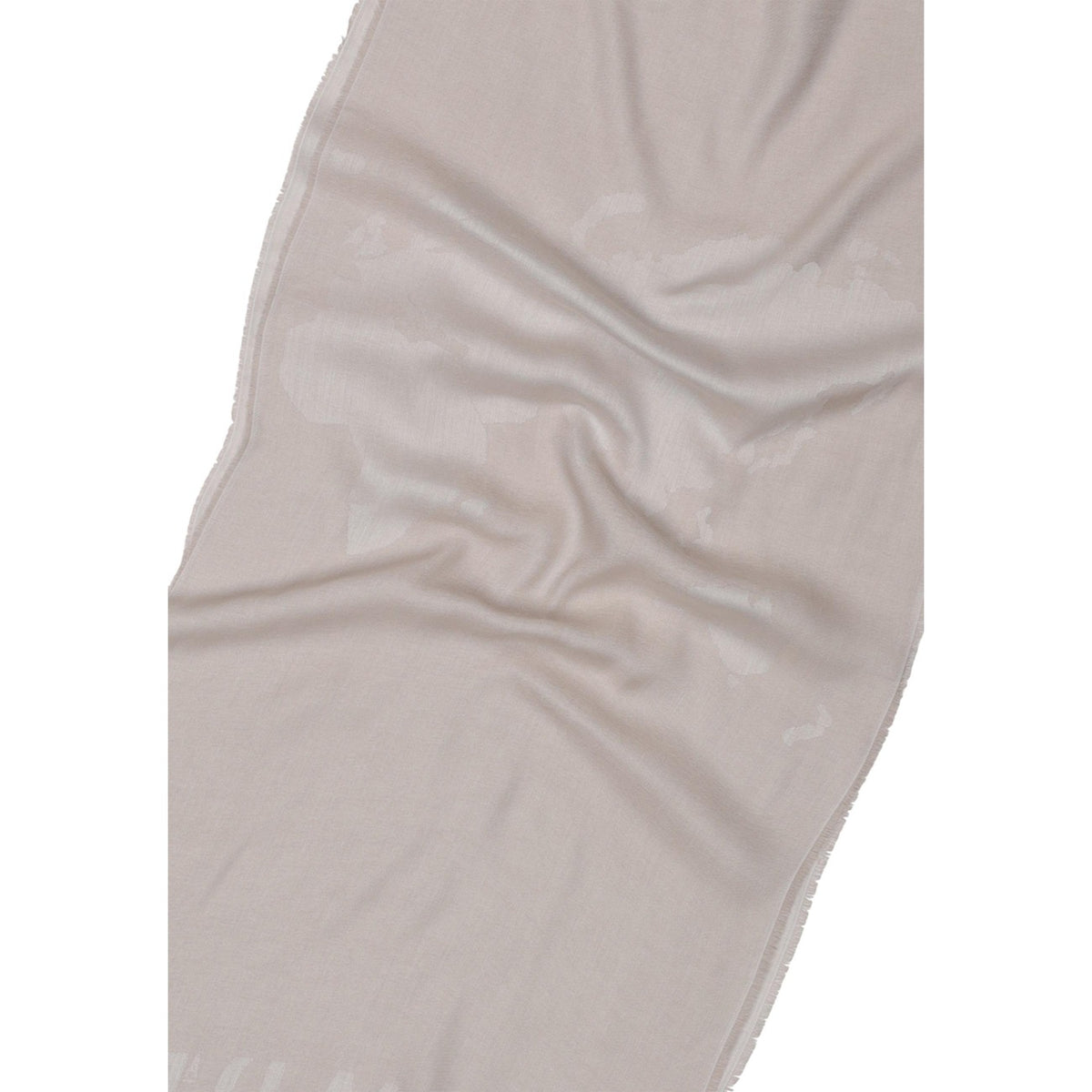Alviero Martini S642 1845; sciarpa in viscosa e modal con motivo Geo ton sur ton. L'accessorio luxury discreto e versatile per ogni stagione.