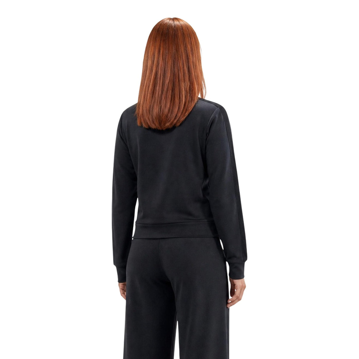 Felpa Nera Donna Guess Active Lyra High Neck; Tessuto elasticizzato in poliestere, modal ed elastam con chiusura full zip e colletto alto. Tasche laterali e logo sul petto, stile sportivo mezza stagione. Vista posteriore