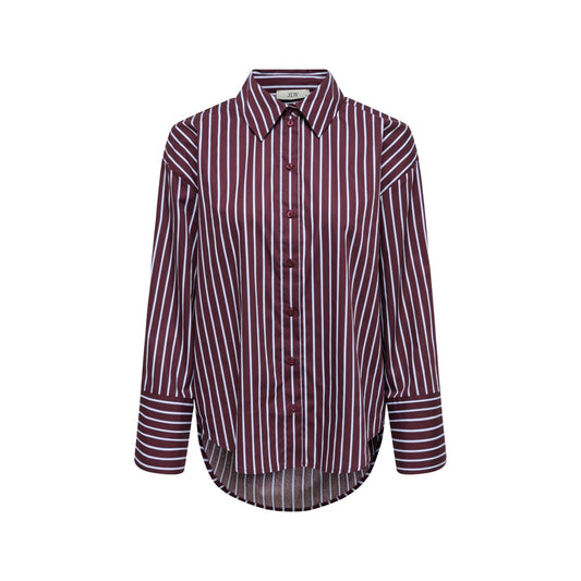 Camicia JDY a righe verticali in puro cotone, vestibilità dritta, maniche lunghe con polsini alti e chiusura a bottoni; capo versatile per ogni stagione. Vista frontale stesa