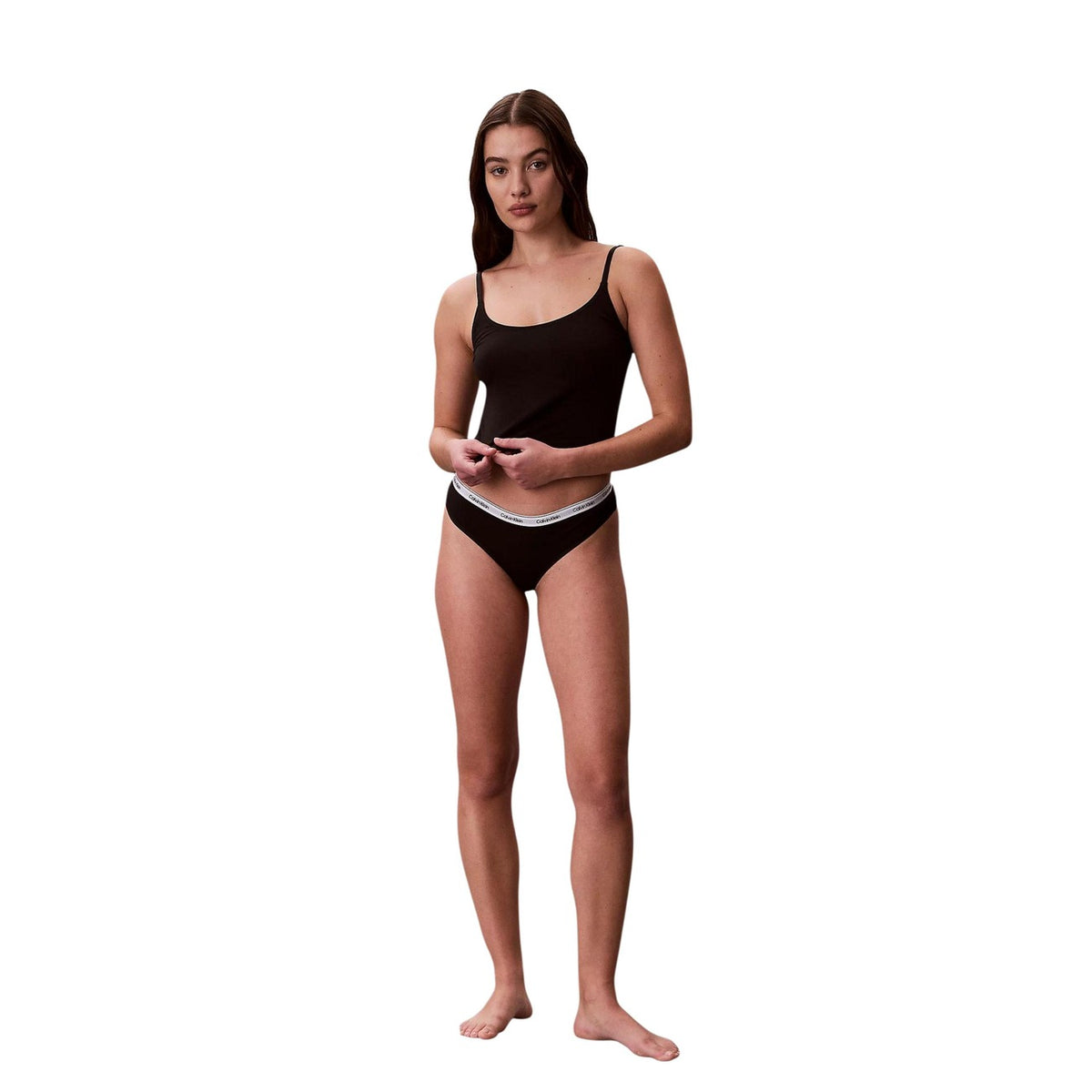Multipack 3 Slip Brasiliana Donna Calvin Klein; Tessuto elasticizzato in cotone e lycra nei colori nero, bianco e stampa animalier. Modello a vita media con taglio brasiliano sensuale e fascia elastica logata, stile casual essentials 4 stagioni. Nero figura intera