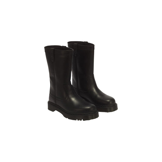 Stivali neri donna Dr Martens Anistone Pull On Wanama 43165001. Stivaletti biker calzata rapida in pelle nera satinata con fibbie decorative, tacco largo 4 cm, tiranti logati e cucitura gialla.
