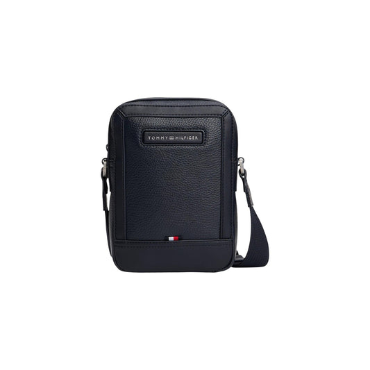 Tracolla uomo Tommy Hilfiger Mini Reporter; 100% Poliuretano. Logo applicato, tracolla regolabile, chiusura con zip. Borsa compatta uomo, versatile e moderna. Vista frontale