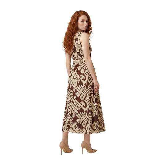 Vestito Midi JDY Diego; Geometrico, 100% Cotone. Corpetto smock elasticizzato, fantasia geometrica, senza maniche. Gonna a balze vaporosa, stile elegante e leggero. Vista Posteriore
