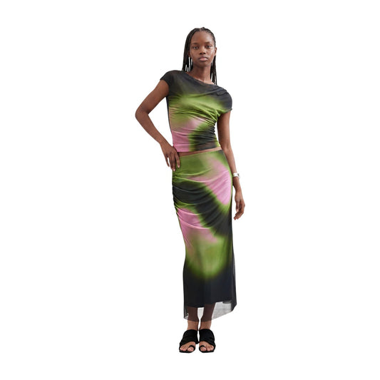 Gonna tubino Desigual donna nera fantasia astratta FAL CRACOVIA. Gonna elasticizzata al ginocchio con motivi verdi e viola, vestibilità aderente e zip sul retro, abbigliamento donna autunno inverno.