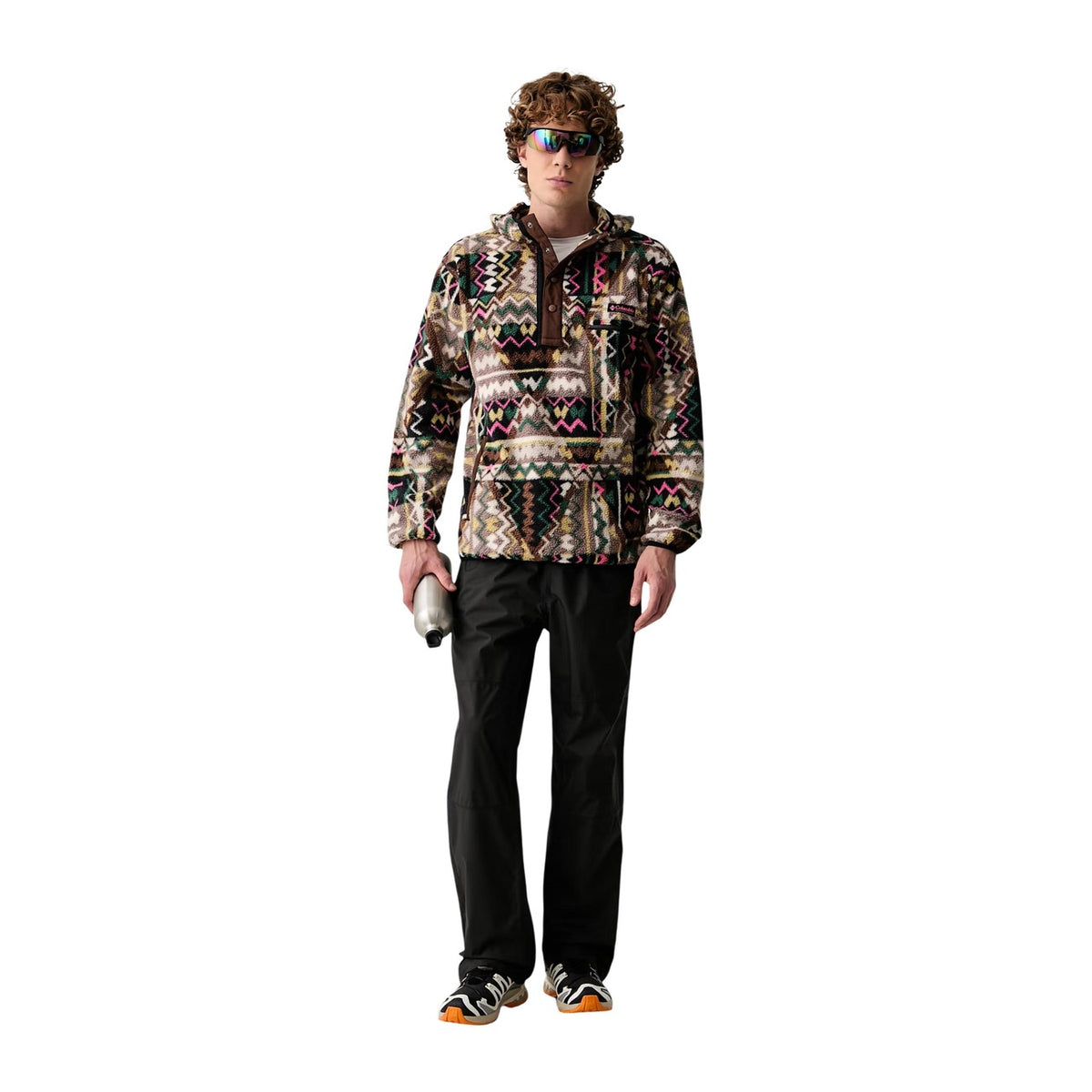 Pile Columbia uomo Helvetia Black Geomix. Giacca pullover in pile Sherpa a pelo lungo con cerniera mezza lunghezza, motivo geometrico nero e grigio, tasca pettorale con zip, abbigliamento outdoor e streetwear