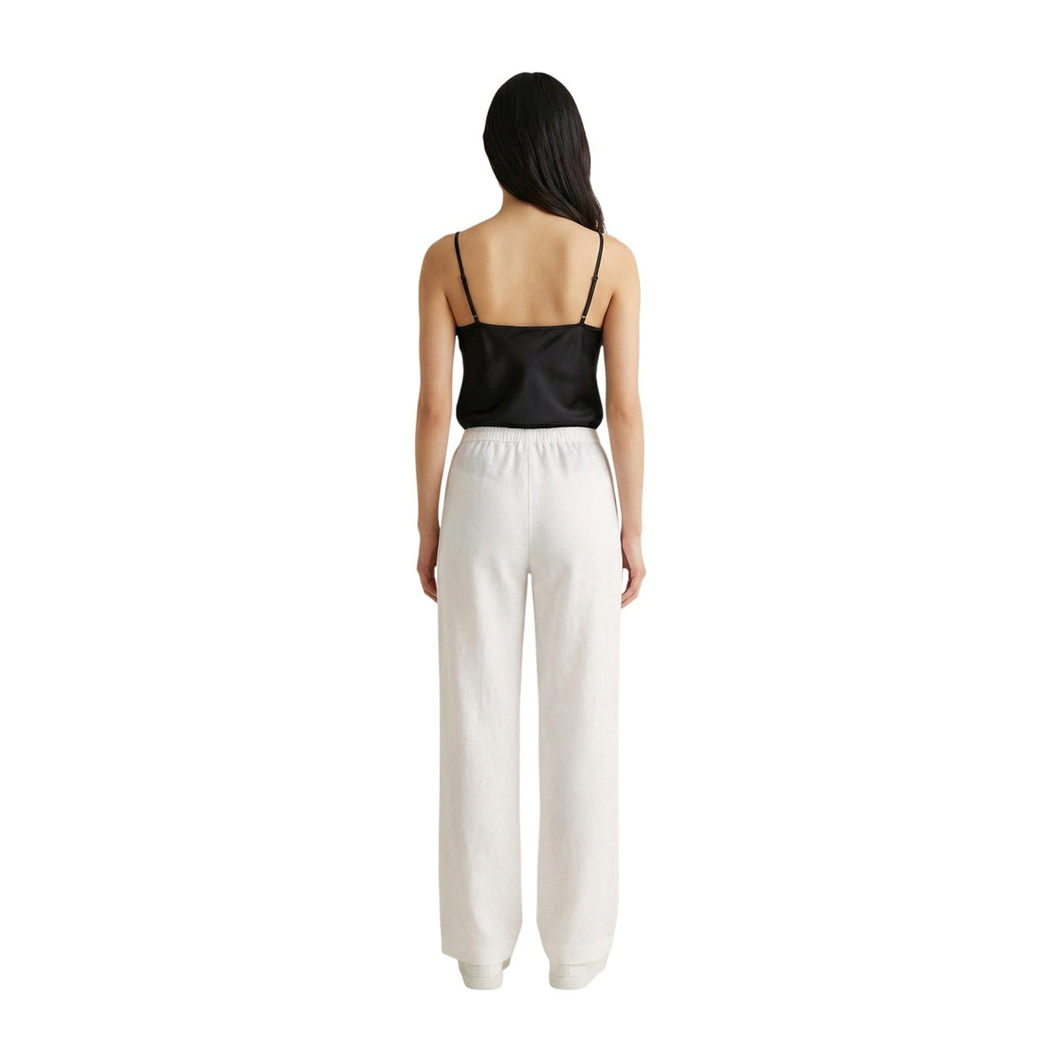 Pantaloni Wide Leg Bianchi Only; Effetto Lino. Vita elastica con coulisse, tessuto leggero in viscosa, vestibilità ampia. Freschezza e stile minimalista per l'estate. Vista posteriore figura intera