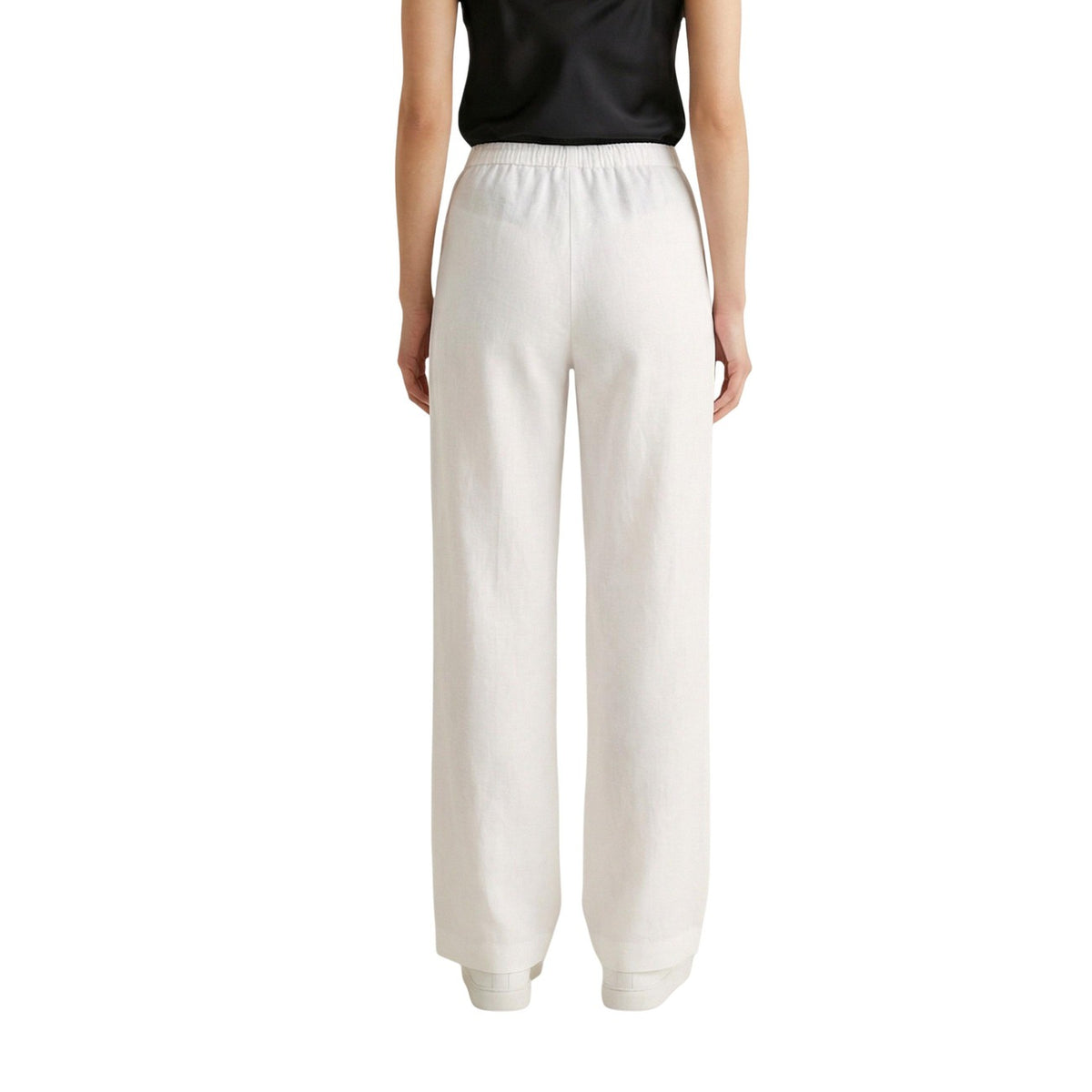 Pantaloni Wide Leg Bianchi Only; Effetto Lino. Vita elastica con coulisse, tessuto leggero in viscosa, vestibilità ampia. Freschezza e stile minimalista per l'estate. Vista posteriore