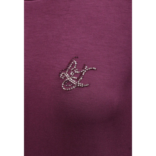 Felpa Liu Jo donna viola girocollo TF6206 J3958. Maglia sportiva mezza stagione in viscosa ed elastan con logo brillante in micro strass sul petto, polsini e fondo elasticizzati, abbigliamento casual donna.