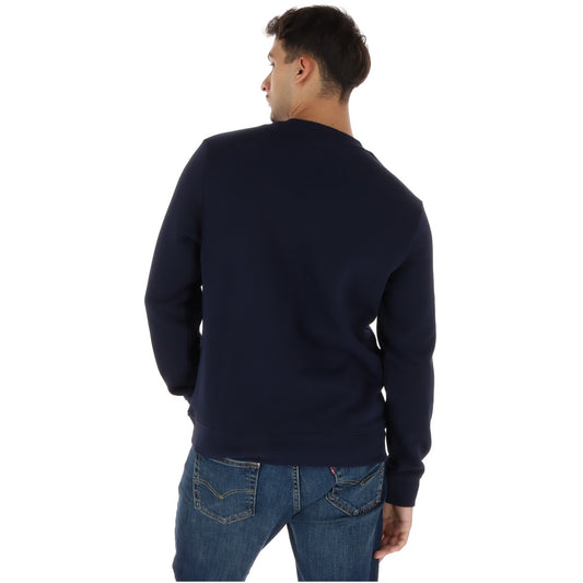 Felpa Napapijri blu da uomo NP0A8BM21761. Pullover sportivo girocollo in cotone 90% e poliestere 10% con dettagli ricamati e maniche lunghe per l'autunno/inverno.