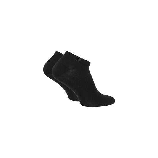 Pack 3 Paia Calzini Sneaker Calvin Klein; nero. 69% Cotone, 29% Fibre tecniche, 2% Elastam. Logo CK ricamato, traspiranti, taglio basso casual.