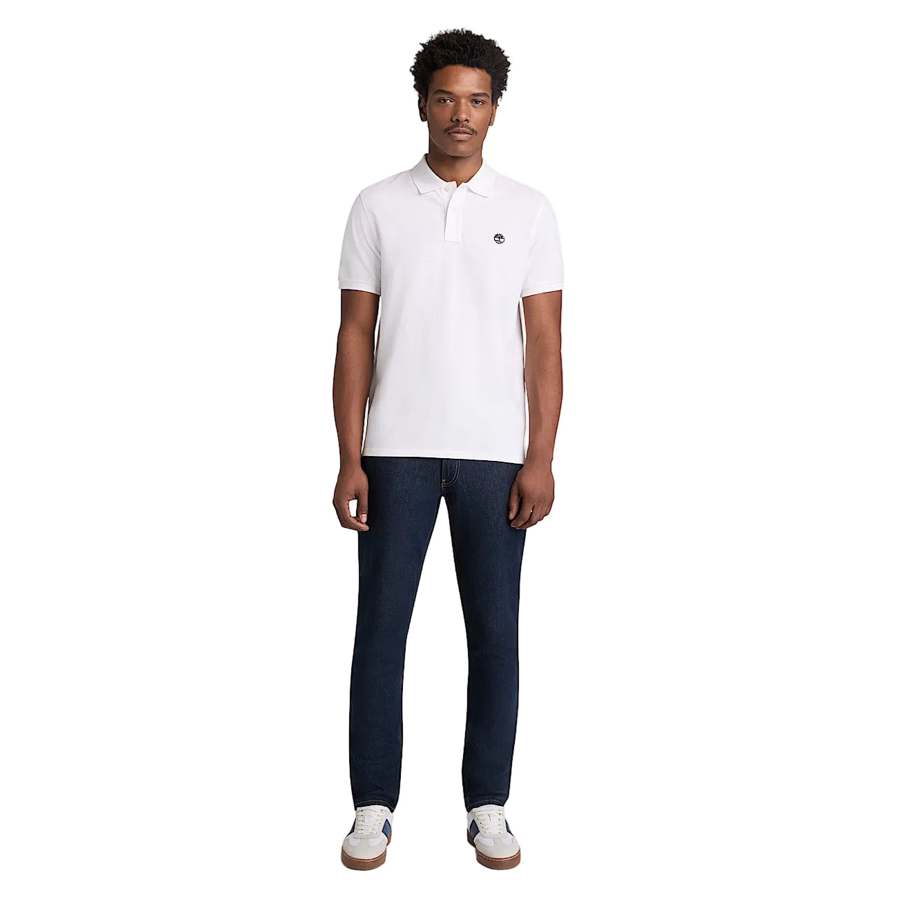 Polo Timberland regular basic con logo uomo bianca maniche corte colletto polo 97% cotone 3% elastan - vista frontale Indossata da modello figura intera 