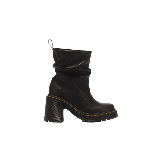 Stivaletti neri donna Dr Martens Kasey Lo 43119001. Stivali bassi senza lacci in pelle morbida nera Virginia a grana fine con tacco largo chunky, suola rialzata e cucitura gialla Dr Martens.