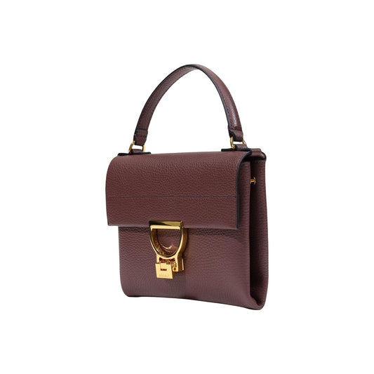 Borsa Coccinelle donna Flat Mini pelle viola scuro E1 MD5 19 03 01. Pochette elegante in vera pelle con tracolla e cerniera zip, borsa piccola da sera e tempo libero pelletteria italiana.