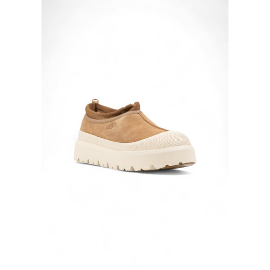 Ciabatte UGG beige impermeabili unisex – Sabot in camoscio con galoscia e fodera calda 1144096.