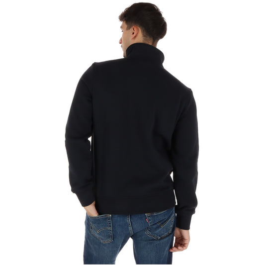 Felpa Napapijri Balis zip nero uomo NP0A8A5Z9411. Felpa leggera a maniche lunghe con cerniera frontale, colletto alto, tasche laterali e vestibilità regolare in cotone.