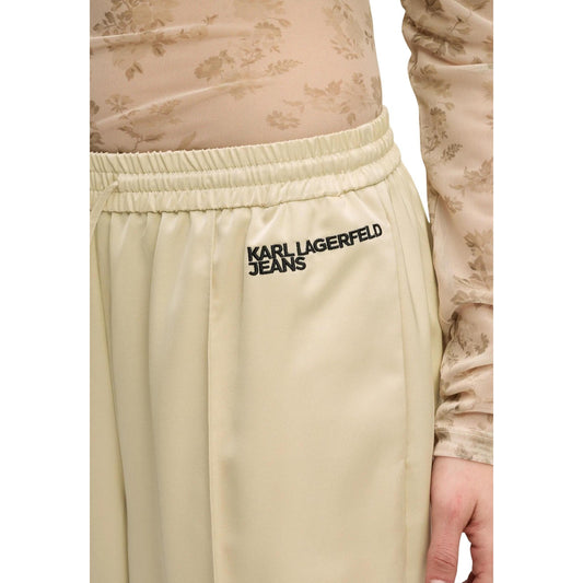Pantaloni Palazzo Raso; 100% Poliestere. Vita elastica, cuciture pintuck, silhouette fluida. Pantalone donna elegante, luminoso e confortevole per eventi e tempo libero.