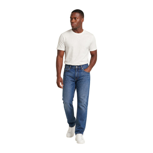 Jeans Uomo Blu Tommy Hilfiger Jeans; Modello Ryan Slim. 99% cotone e 1% elastam, vita media e chiusura con zip. Design 5 tasche con effetto vissuto e cuciture a contrasto, stile casual 4 stagioni. Figura intera frontale 