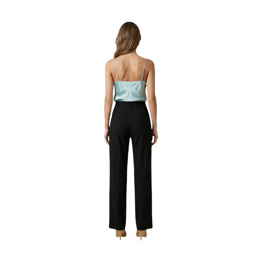 Top Artigli ACTP004367; 100% Poliestere Satin. Spalline sottili, scollo morbido, finitura lucida. Canotta donna elegante, anti-piega e luminosa per la PE26. Colore verde menta vista posteriore 