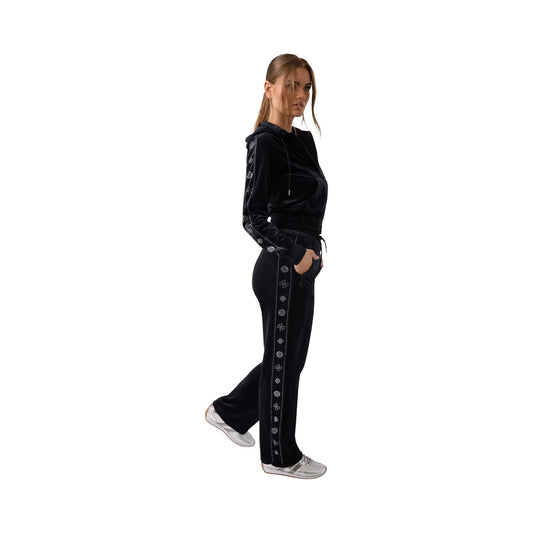 Pantaloni tuta neri skinny donna Guess Active Amalia AMALIA SKINNY PANTS. Pantaloni sportivi aderenti a vita media in tessuto riciclato con strass e tasche zippate.