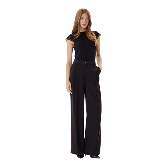 T-shirt Donna Nera Morgan De Toi 252-DODO; Maglia elasticizzata slim a maniche corte con inserti in pizzo sulle spalle e retro trasparente in tulle a pois con chiusura a goccia. Figura intera frontale 