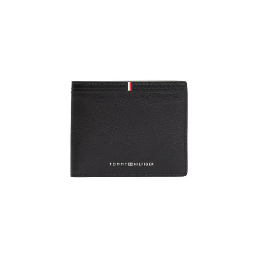 Portafoglio mini Tommy Hilfiger con portamonete; 100% Pelle Nera. Logo Flag tricolore, profilo ultra-slim (1 cm), scomparti multifunzione. Stile raffinato e pratico. Vista frontale 