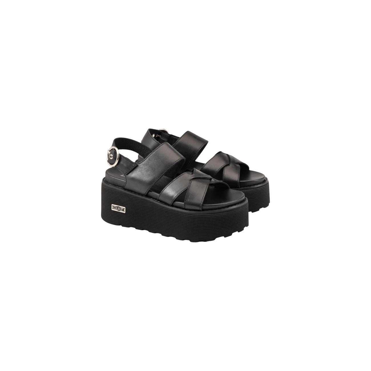 Sandali Platform Cult Nancy; Nero. 100% Pelle, tacco 6 cm. Fasce incrociate, chiusura con fibbia, suola a righe con logo metal. Grintosi, alti e ultra-moderni. Laterale frontale 