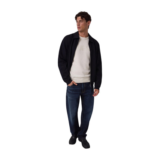 Maglione beige uomo Guess Noburo M6BR16 Z1364. Pullover girocollo a maniche lunghe in maglia rasata beige con logo Guess impresso a rilievo sul petto e finiture costinate.