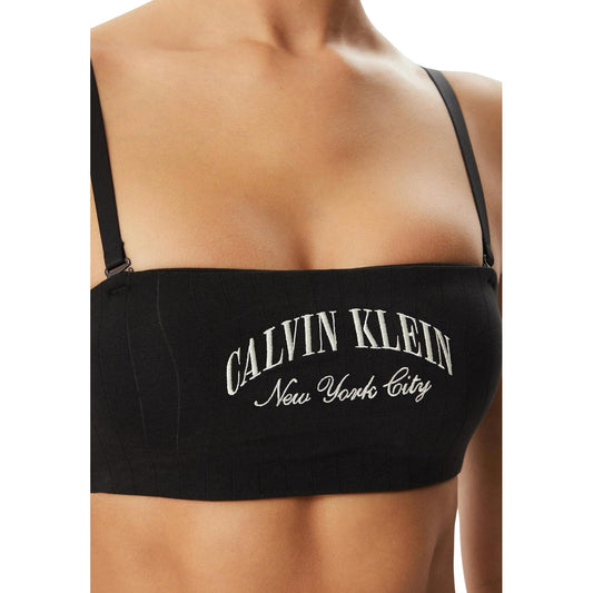 Reggiseno Fascia Nero Donna Calvin Klein Lightly Lined; Tessuto a coste in cotone ed elastam con coppe morbide e spalline staccabili. Modello pull-on con logo ricamato sul davanti, stile casual primavera-estate. Dettaglio