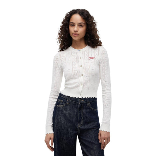 Cardigan Donna Bianco Tommy Hilfiger Jeans; Maglia slim fit traforata a maniche lunghe con bottoni, scollo tondo e motivo pointelle a bandierine. Dettagli smerlati, stile preppy casual e raffinato. Vista frontale 