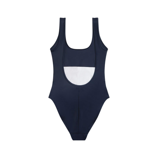 Costume Intero Tommy Jeans Color Block; Skinny Fit. Tessuto stretch in nylon, profondo scollo sulla schiena, sgambatura alta. Logo distintivo sul fianco, ideale per sport e tempo libero. Vista posteriore 