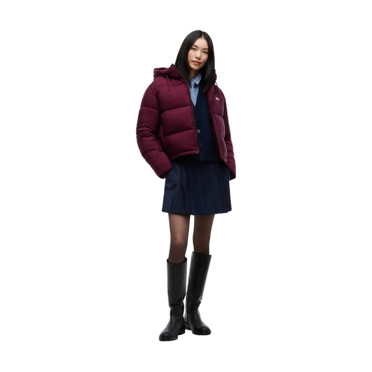 Giubbotto imbottito ripstop cappuccio calypso berry donna Tommy Jeans DW0DW21625V11. Giubbino invernale rosa calypso berry con logo tono su tono.
