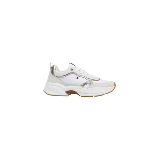 Sneakers Tommy Hilfiger Gold; 100% Nappa metallizzata. Suola chunky, interno traspirante in poliestere, soletta rimovibile. Dettagli branding smaltati, stile running anni '90, stagione Primavera/Estate. Vista laterale 